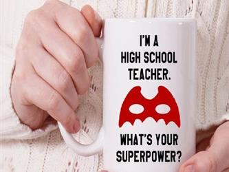 Person holding a mug that says Im a teacher. Whats your super power?